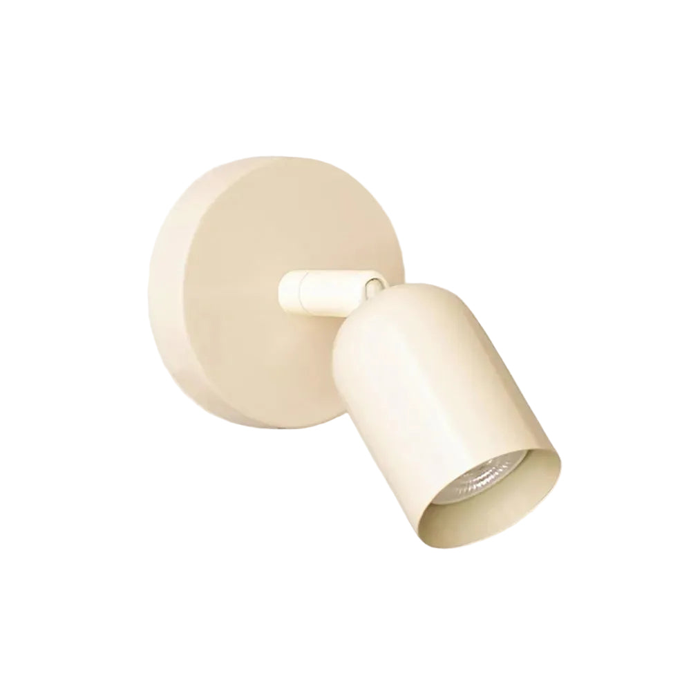Beige wall-mounted light fixture on a white background
