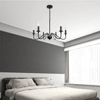 Chandelier in a bedroom and dining area with neutral color palette.