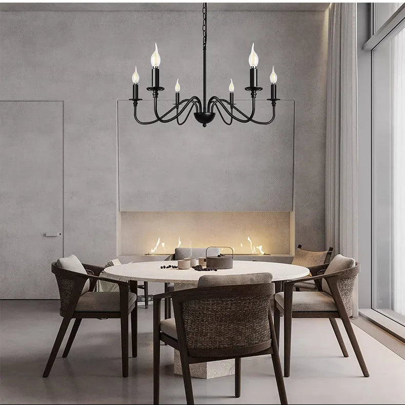 Chandelier in a bedroom and dining area with neutral color palette.