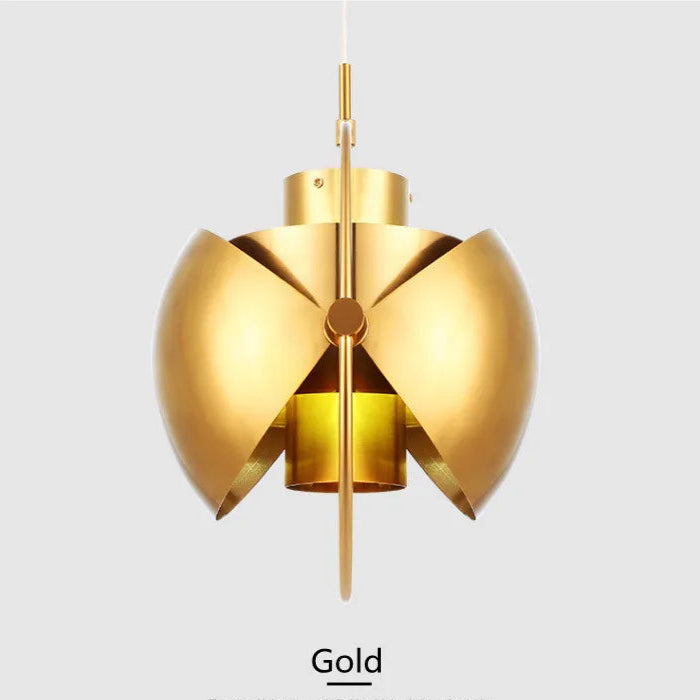 Gold pendant light on a gray background