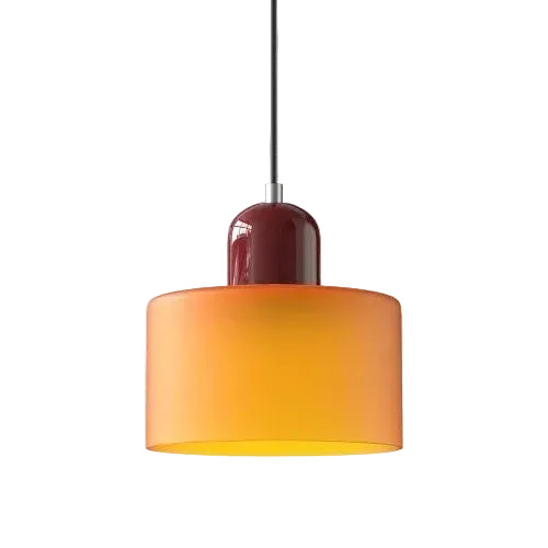 Pendant light with orange shade and red base on a white background